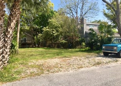 Lot is level and cleared with sewer tap in place.