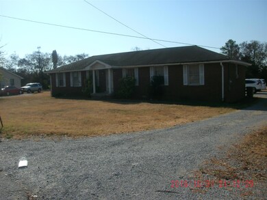 Driveway and right side of home.