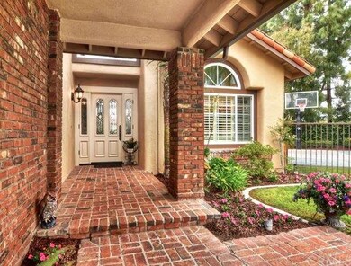 Beautiful entry with classic brick accents.
