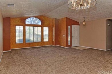 Entry and part view of living room