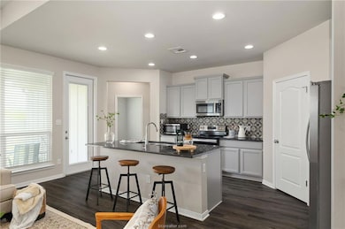 Adjacent to the dining room, the
spacious and ope