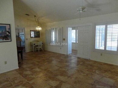 Property Photo. Tile floors in living room, dining