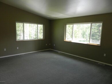 Living Room W/ Vaulted Ceiling