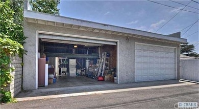 Over Sized 4 Car Garage With Overhead Storage And 