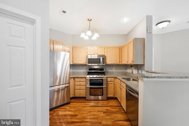 14324 Climbing Rose Way unit 102, Centreville, VA 20121 - photo 4