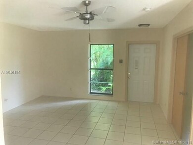 Living room with new hurricane proof door