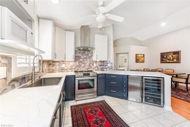 Kitchen with ice maker and wine cooler