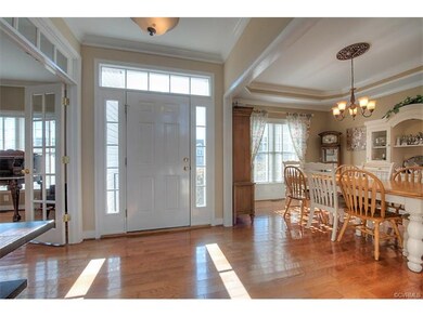 Gleaming hardwood floors and lovely moldings great