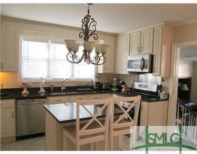 Kitchen. All stainless steel appliances remain.  T