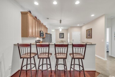 Kitchen with a breakfast bar, stainless steel appl