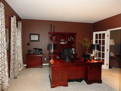 Den. Spacious den with French doors leading to the