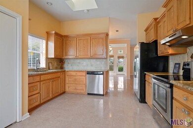 Large kitchen with all the appliances to remain.
