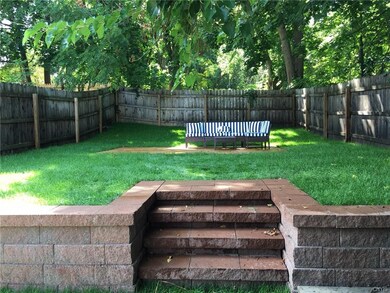 The backyard features this brand new hardscape, fl