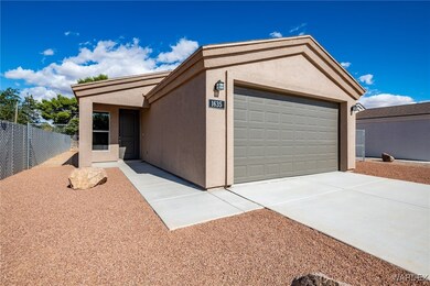 View of front of property with a garage