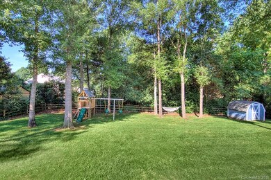 Large, flat, & private back yard with storage shed