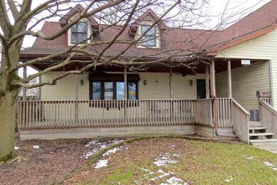 Beautiful front porch with two fans.