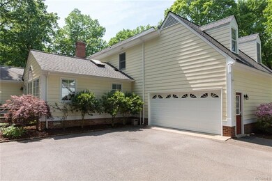 Two car garage on back of the house with exterior 