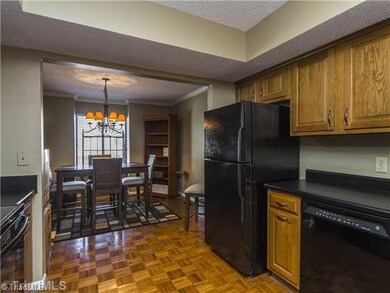 Kitchen. The kitchen is open to the dining room - perfect for interacting with guests as you put the finishing touches on dinner.