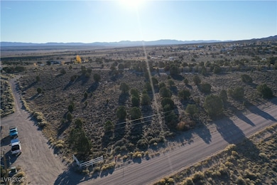 Aerial overview of property's location with mountains and rural landscape