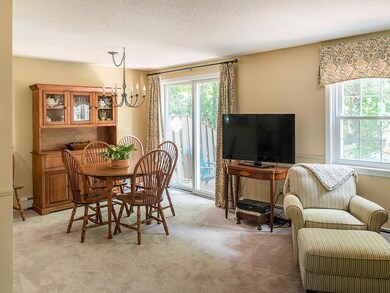 Informal dining area opens to rear deck.