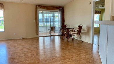 BREAKFAST NOOK WITH SLIDERS TO NEW LANAI