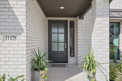 View of front of house featuring a garage and a fr