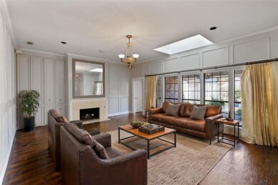 Living room with dark hardwood / wood-style floors