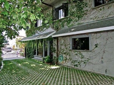 Driveway with squares of grass is so charming
