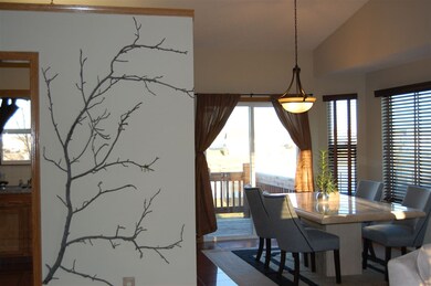 Nice lighting fixtures and sliding doors to the de