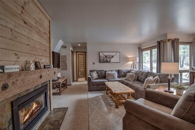 Fresh looking family room with cozy fireplace