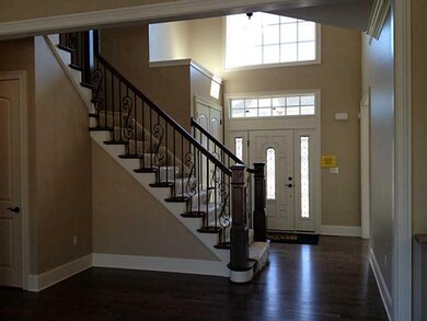 Entry/Foyer. Stunning hardwood floors in entry, ki