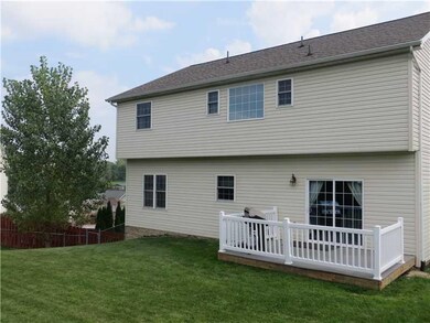 Exterior Back. Trex decking on the rear maintenanc