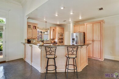 Kitchen bar allows for several bar stools!