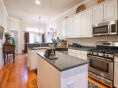 Open, white kitchen