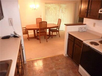 Kitchen. The kitchen conveniently opens to the din