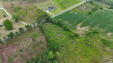 Aerial view of property's location featuring rural landscape