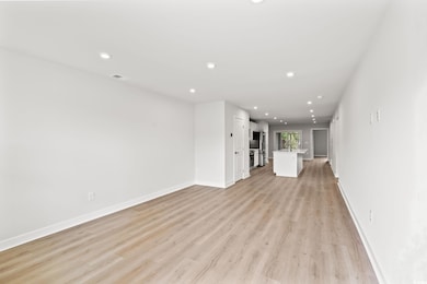 Unfurnished living room with recessed lighting and light wood-style flooring