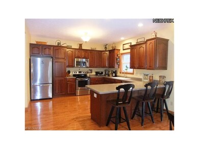 This gourmet kitchen features an abundance of cher