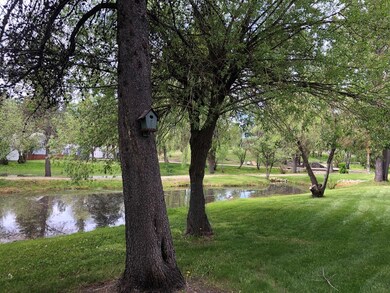Adjacent to a pond