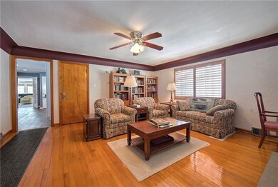 Living room with door leading to 2nd floor bedroom