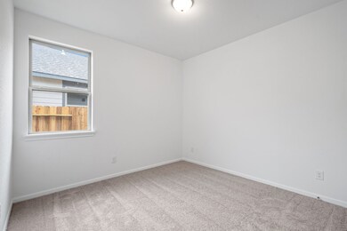 Your secondary bedroom features plush carpet, fres