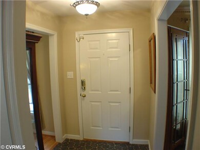 Foyer - Vinyl flooring and hall closet.