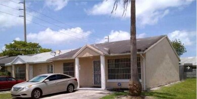 Exterior long shot connected villa/parking