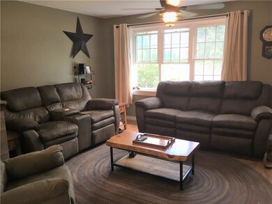 Living room with plenty of natural...