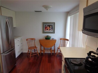 Eat in kitchen features stainless appliances.