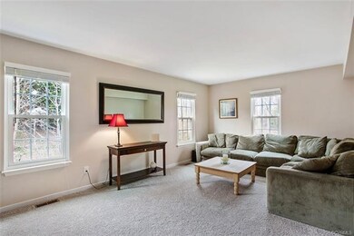Spacious family room with lots of natural light an