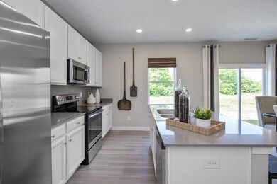 Photos shown may be an artist rendering, model home, or of the same model due to current construction stage different location. 