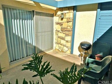 Private patio with sliding glass door entry from f