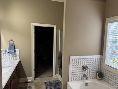 Master bath includes tub, separate shower, water closet and all new tile!