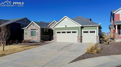 Craftsman-style house featuring a garage